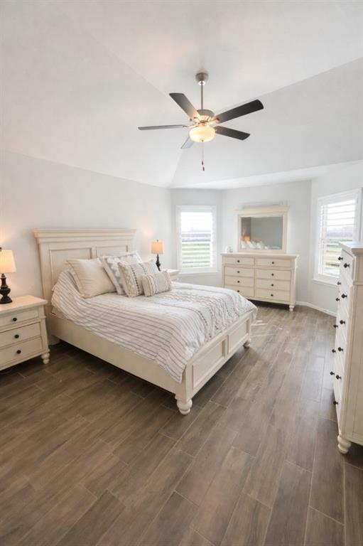6609 Adderly Road Pilot Point, TX 76258 - Photo 5 of 15 a bedroom with a bed and ceiling fan