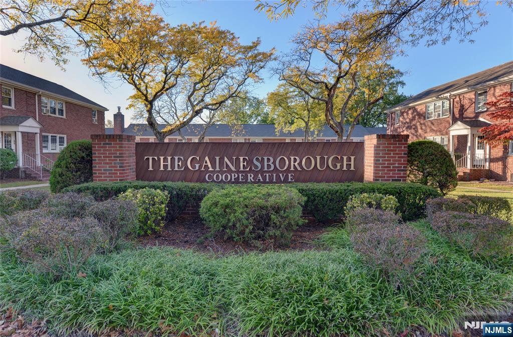 255 Bogert Road, Unit 2A River Edge, NJ 07661 - Photo 1 of 25 a sign on the side of a building
