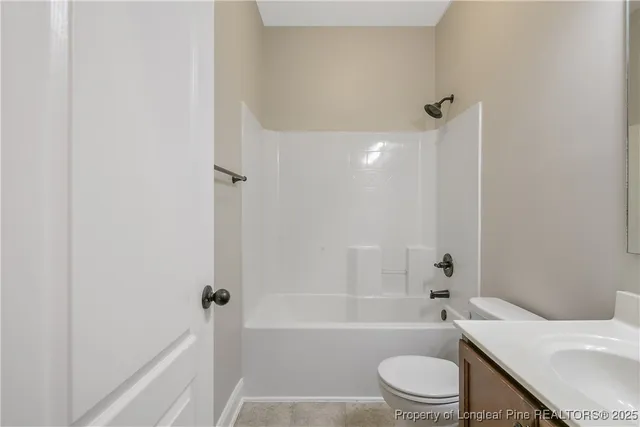 a bathroom with a sink a toilet and a bathtub