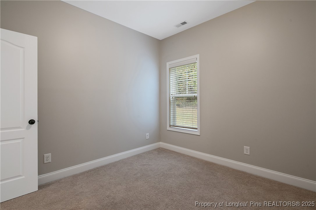 159 English Oak Drive Bunnlevel, NC 28323 - Photo 44 of 48 an empty room with a window