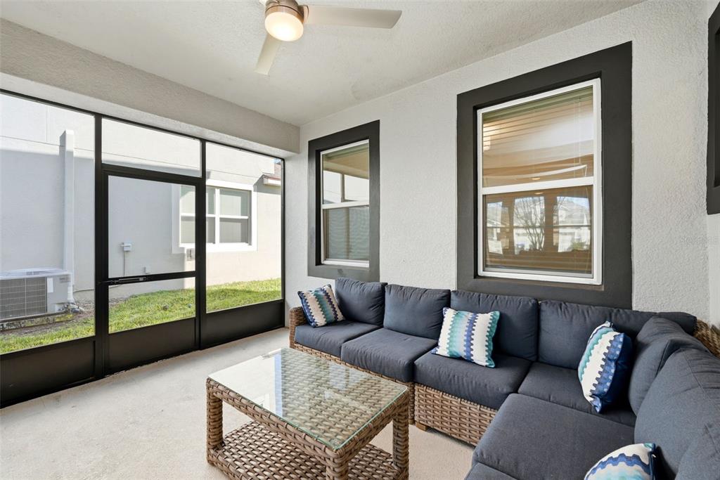16662 Wingspread Loop Winter Garden, FL 34787 - Photo 18 of 24 a living room with furniture and a window