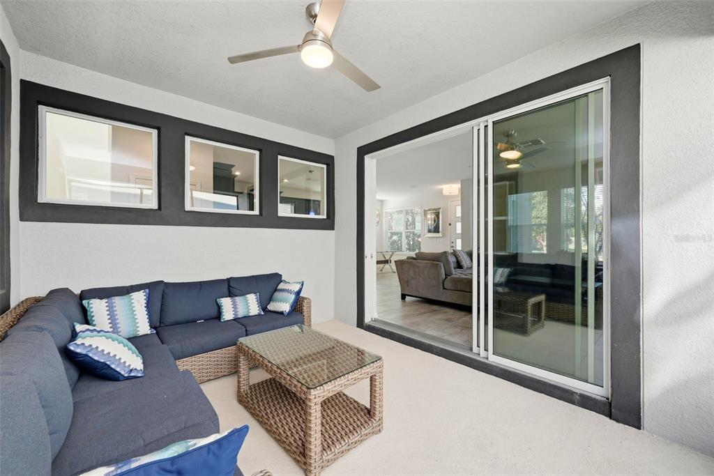 16662 Wingspread Loop Winter Garden, FL 34787 - Photo 19 of 24 a living room with furniture and a large window