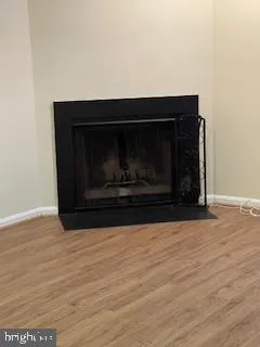 a living room with a fireplace