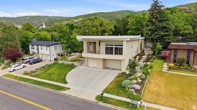 1389 Millbrook Way Bountiful, UT 84010 - Photo 5 of 74 Contemporary residence featuring a flat roofline and integrated garage