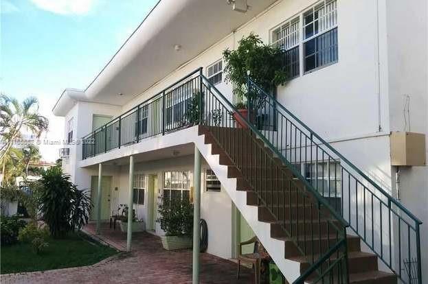 330 84th Street, Unit 12 Miami Beach, FL 33141 - Photo 2 of 2 a view of house with outdoor space and stairs