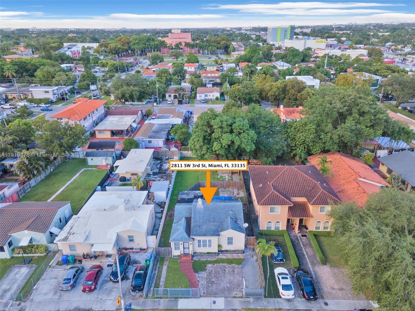 2811 Southwest 3rd Street Miami, FL 33135 - Photo 1 of 40 an aerial view of residential houses with outdoor space