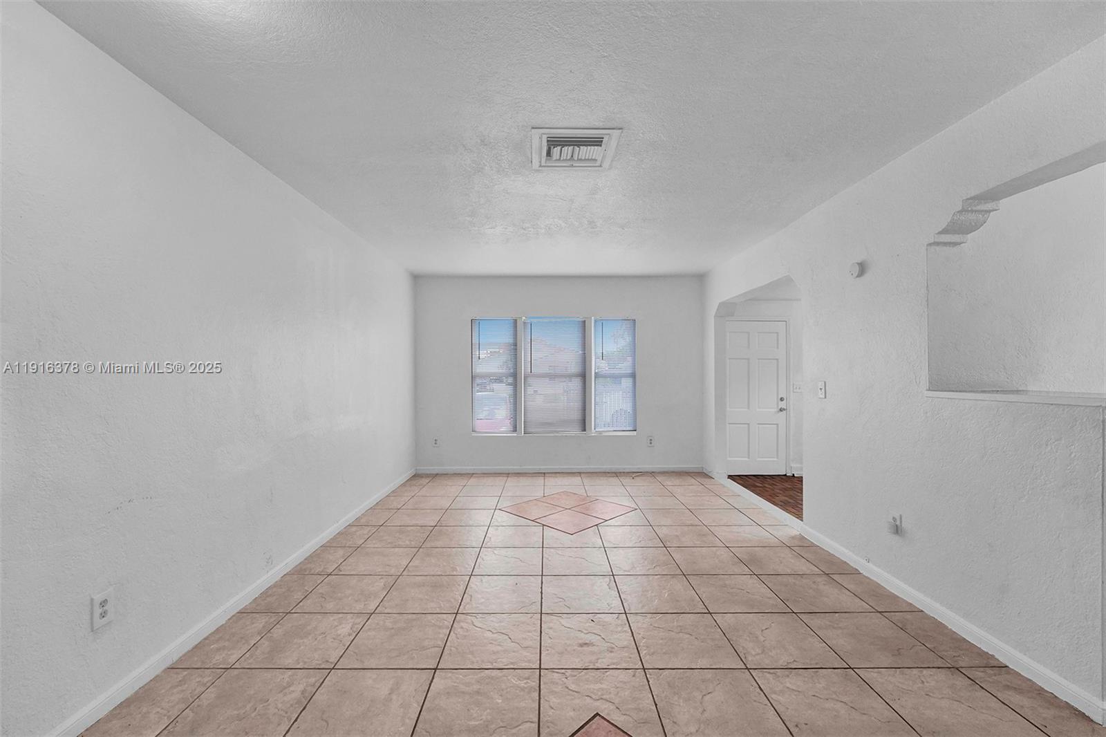 2811 Southwest 3rd Street Miami, FL 33135 - Photo 21 of 40 a view of an empty room and window