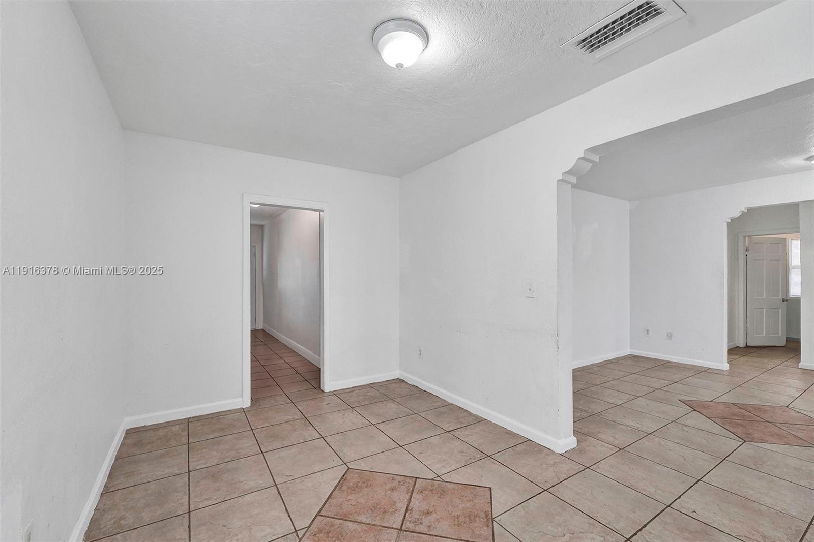 2811 Southwest 3rd Street Miami, FL 33135 - Photo 27 of 40 a view of an empty room and window