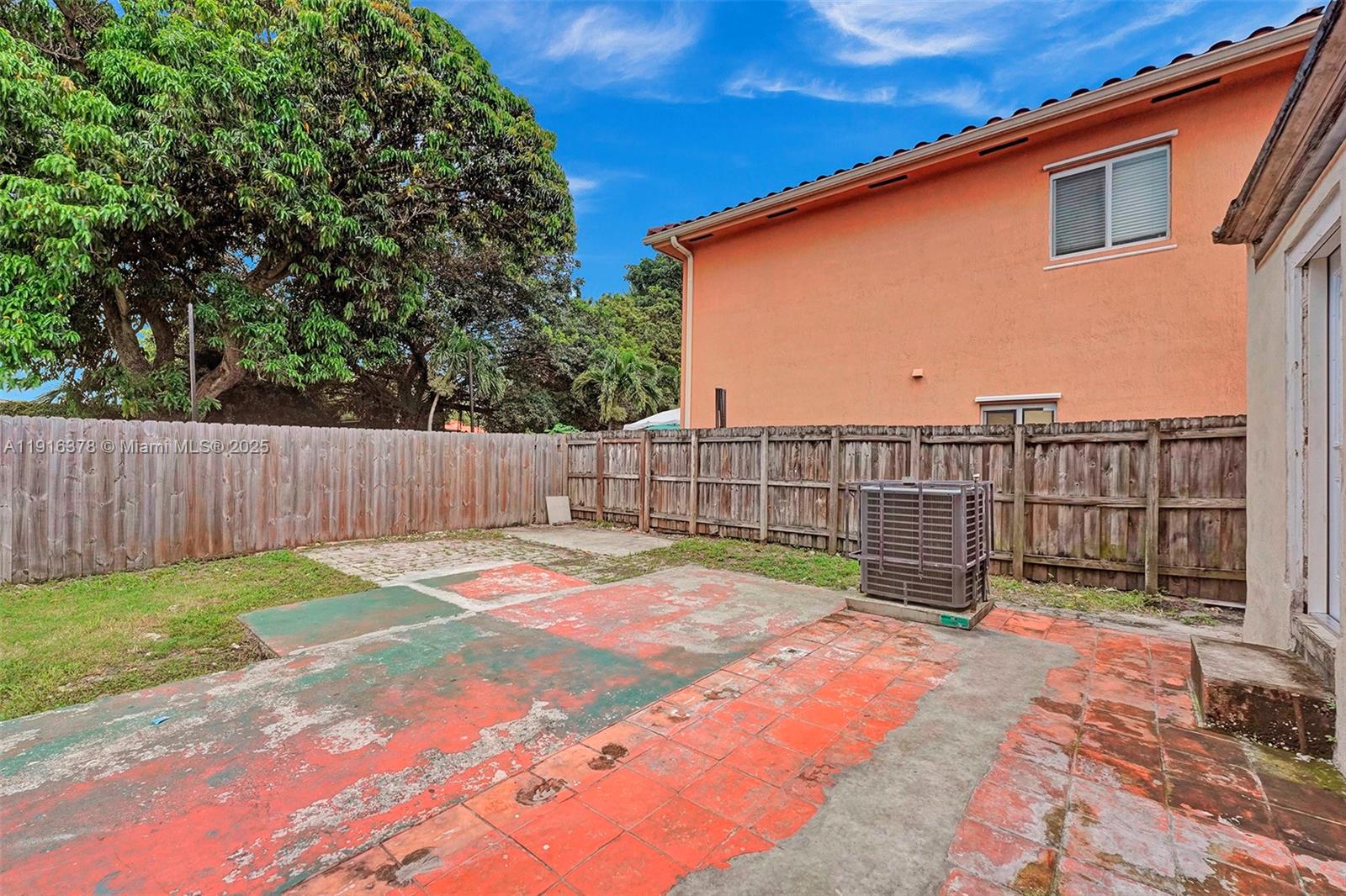 2811 Southwest 3rd Street Miami, FL 33135 - Photo 34 of 40 a backyard of a house with lots of green space