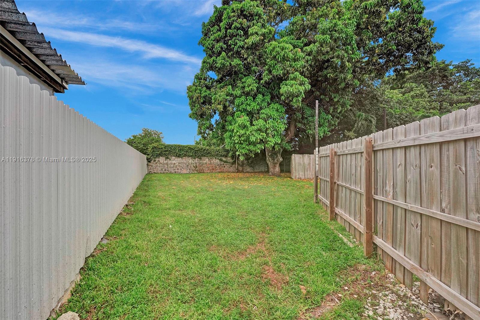 2811 Southwest 3rd Street Miami, FL 33135 - Photo 35 of 40 a view of a backyard with pathway