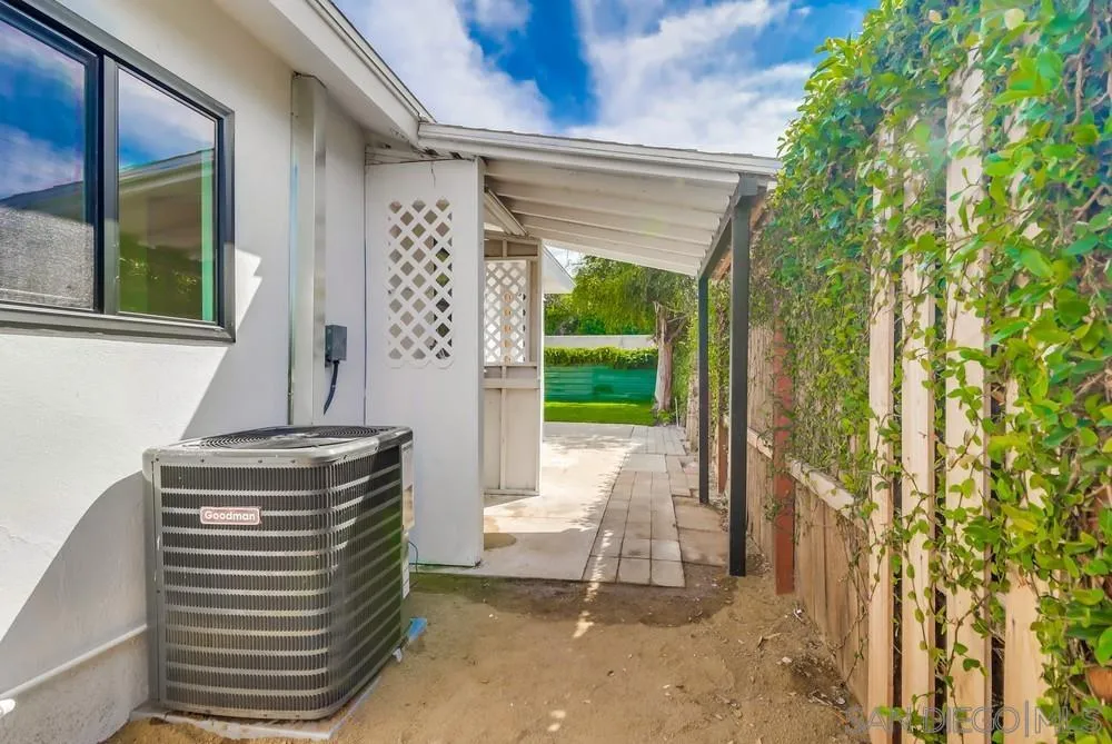 923 Melba Road Encinitas, CA 92024 - Photo 28 of 28 a view of a patio with table and chairs and potted plants with wooden floor