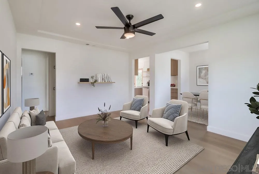 923 Melba Road Encinitas, CA 92024 - Photo 4 of 28 a living room with furniture and a large window