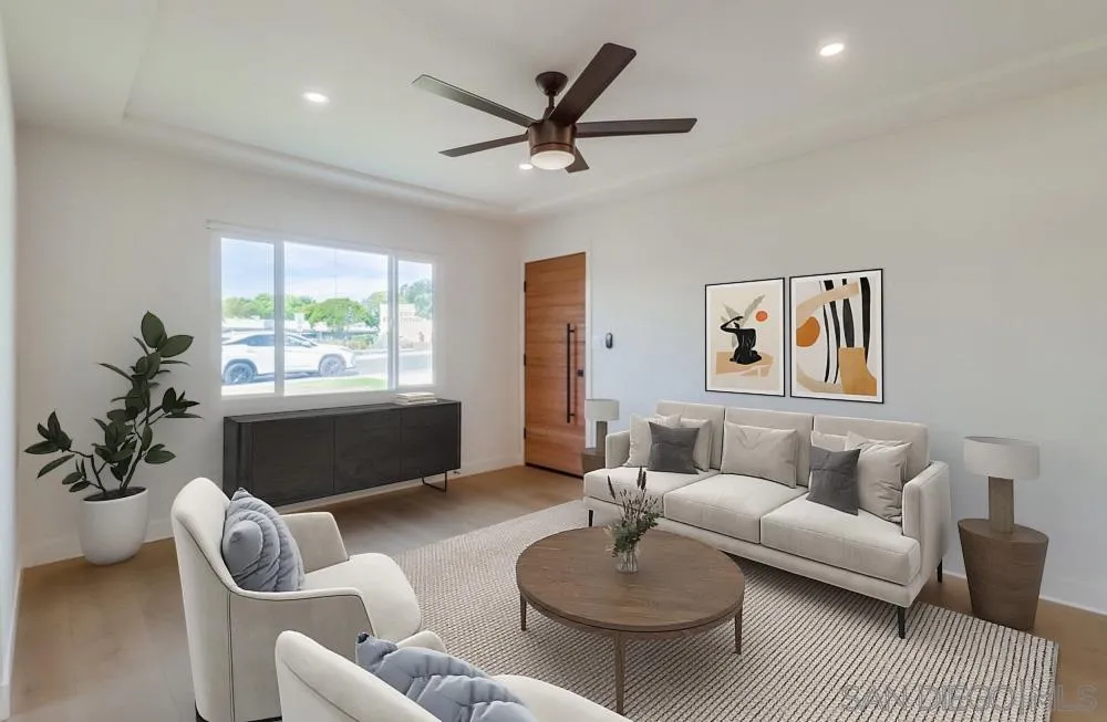 923 Melba Road Encinitas, CA 92024 - Photo 5 of 28 a living room with furniture and a large window