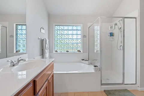 a bathroom with a bathtub and a sink