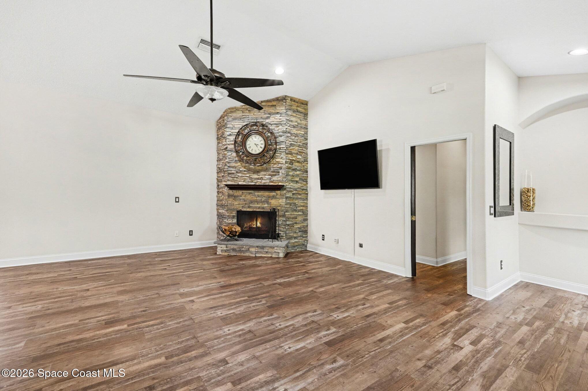 1355 Dalbora Road Merritt Island, FL 32953 - Photo 13 of 37 a view of a livingroom with wooden floor