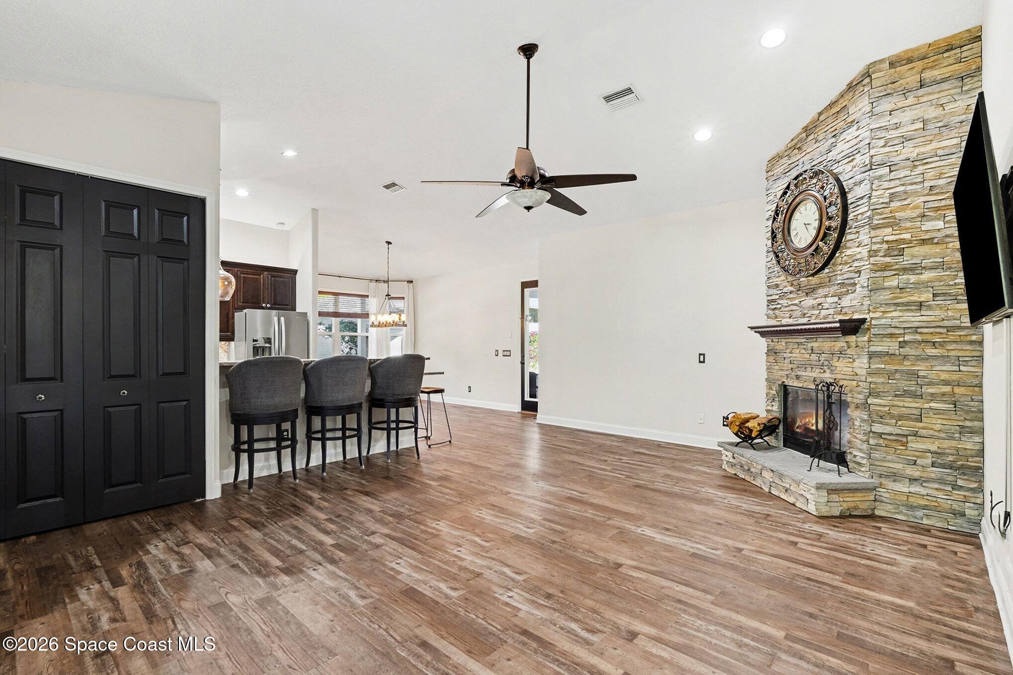 1355 Dalbora Road Merritt Island, FL 32953 - Photo 14 of 37 a view of a livingroom with furniture and a fireplace