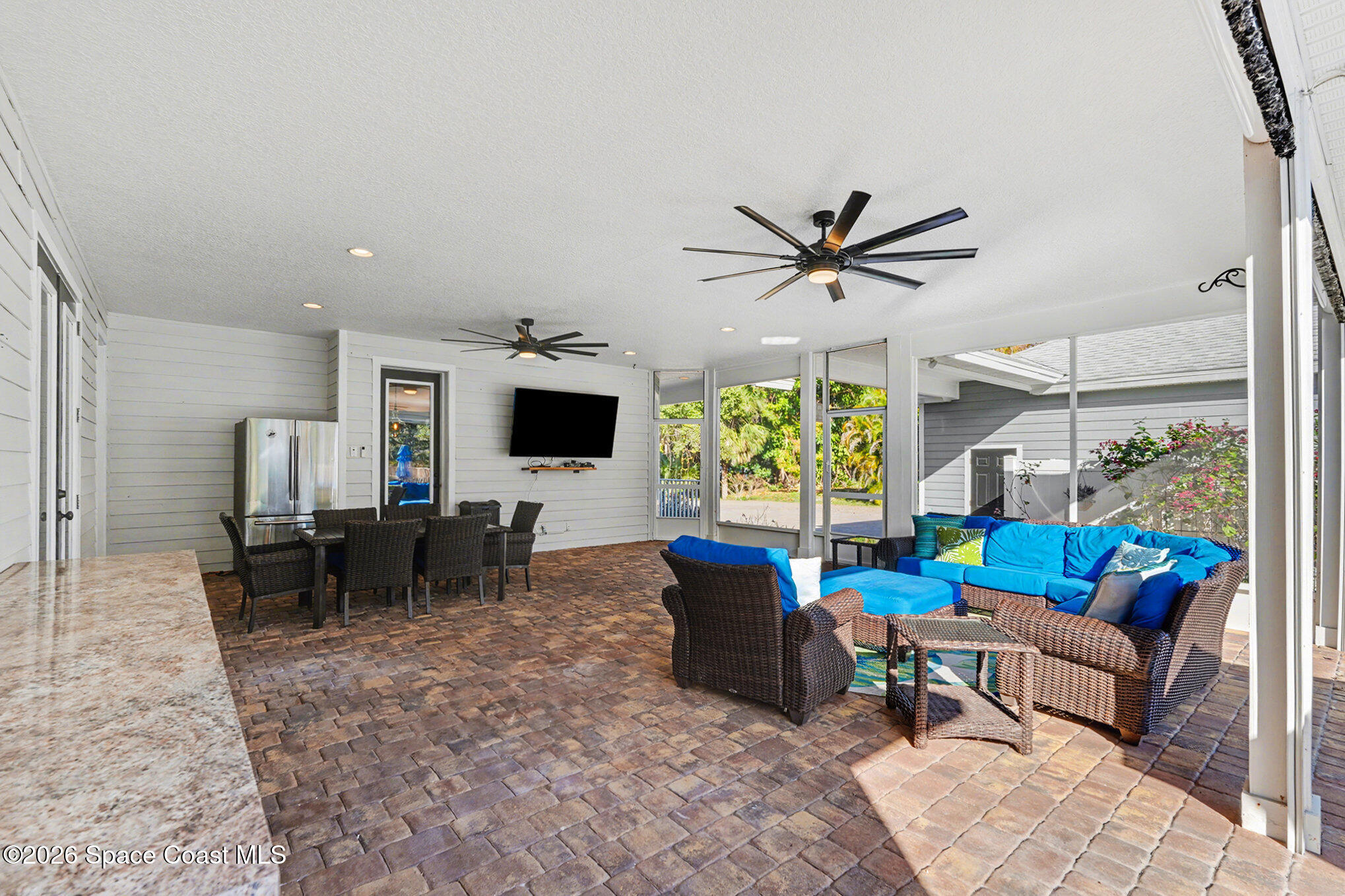 1355 Dalbora Road Merritt Island, FL 32953 - Photo 27 of 37 a living room with furniture and a large window