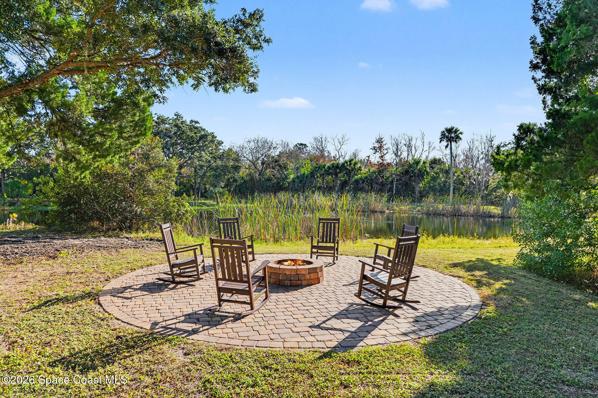 1355 Dalbora Road Merritt Island, FL 32953 - Photo 29 of 37 a view of a lake with couches and city view