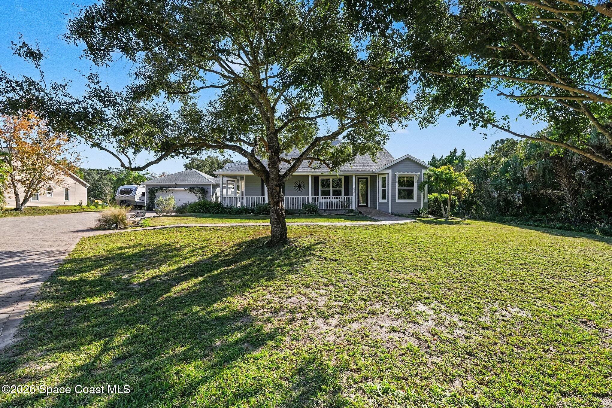 1355 Dalbora Road Merritt Island, FL 32953 - Photo 31 of 37 a view of swimming pool with tree s
