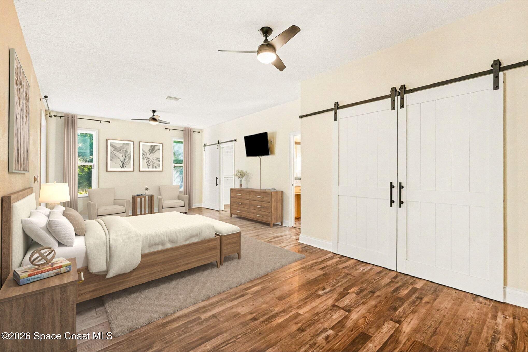 1355 Dalbora Road Merritt Island, FL 32953 - Photo 4 of 37 a bedroom with a bed and a flat tv screen