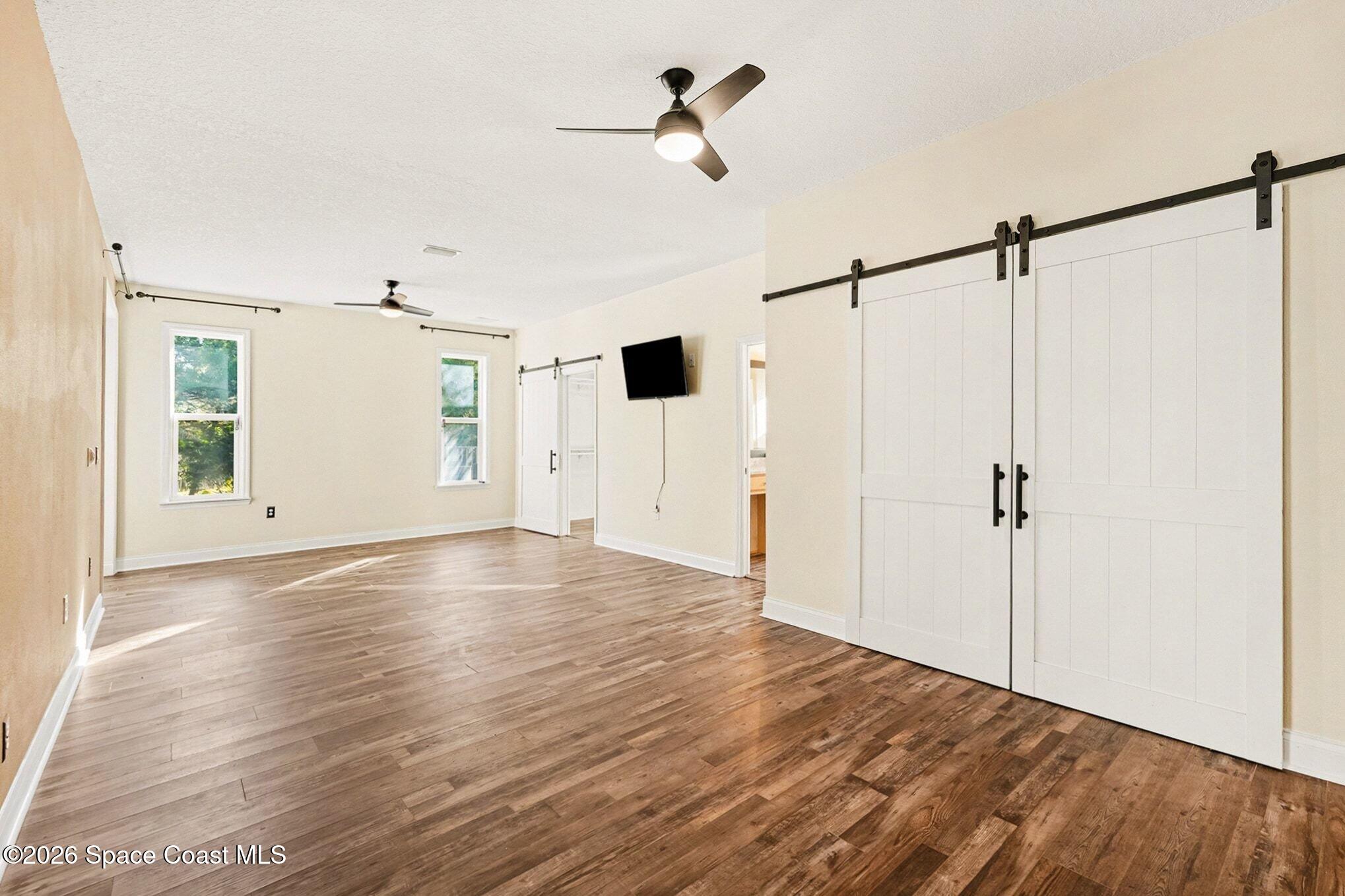 1355 Dalbora Road Merritt Island, FL 32953 - Photo 5 of 37 a view of an empty room with a window