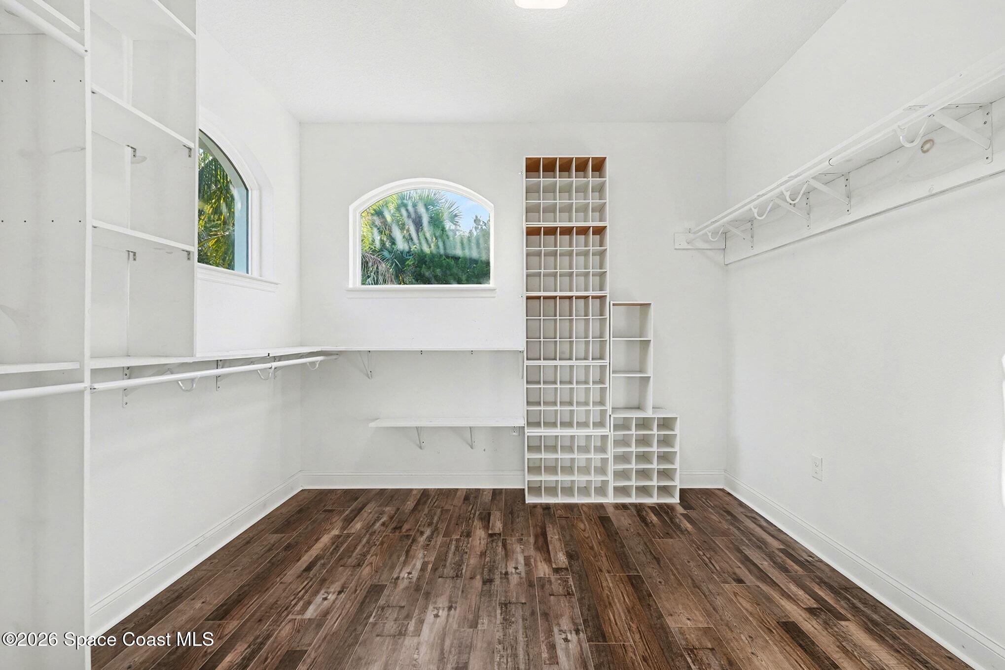 1355 Dalbora Road Merritt Island, FL 32953 - Photo 10 of 37 a view of walk in closet with empty racks