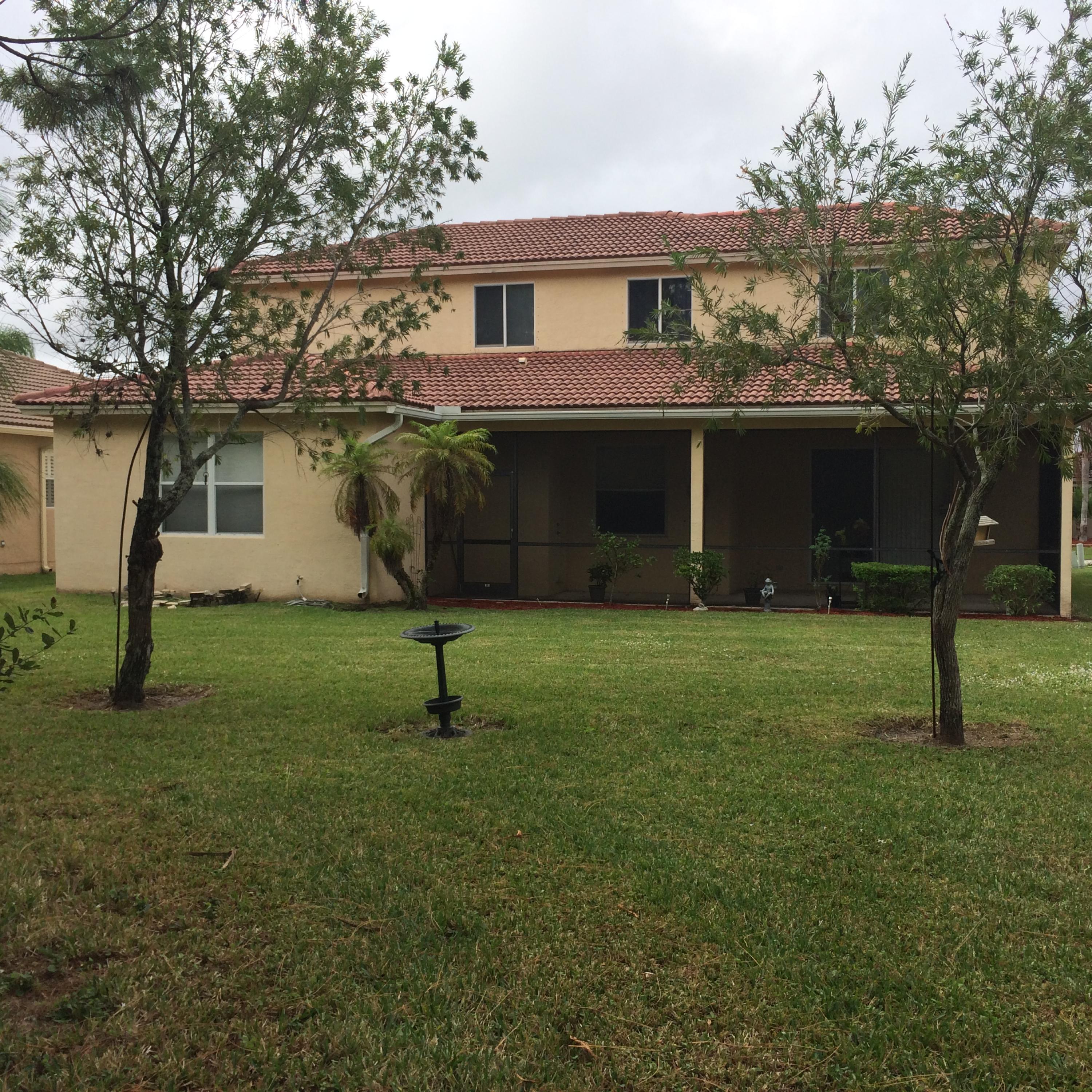 1282 Pebble Ridge Lane West Palm Beach, FL 33411 - Photo 2 of 42 rear