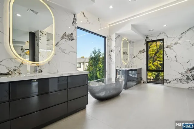 a view of living room filled with furniture and a potted plant