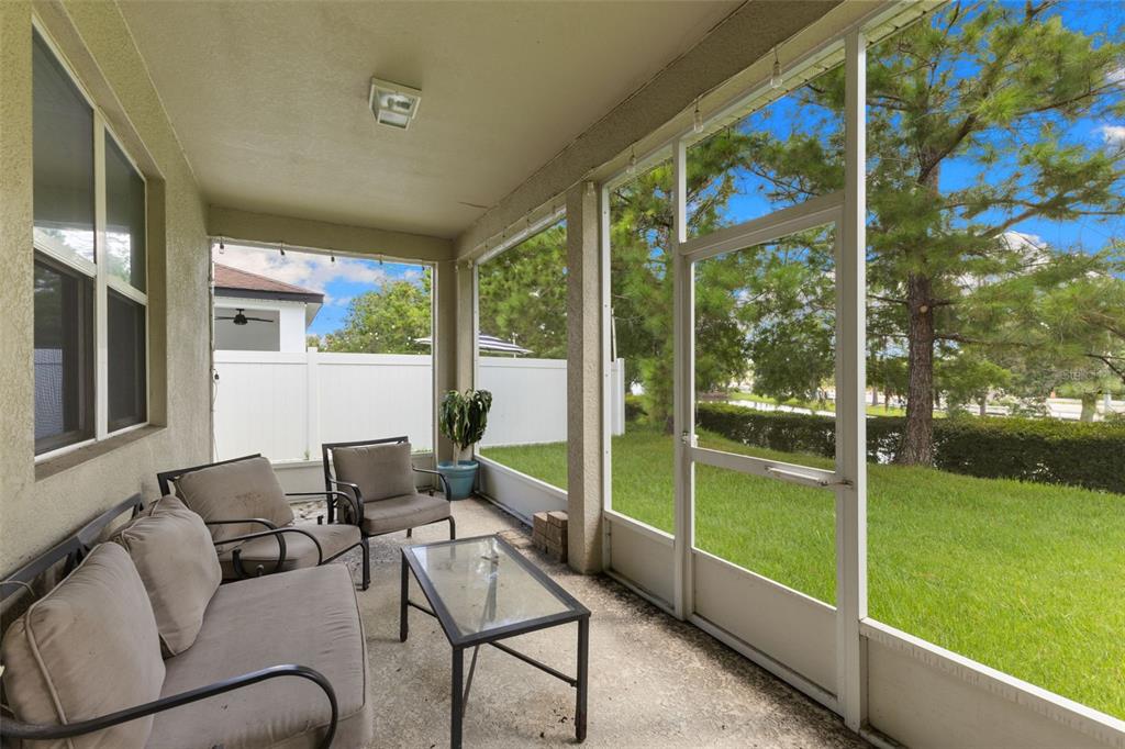 3240 Macintosh Road Land O Lakes, FL 34639 - Photo 25 of 32 a outdoor living space with furniture and garden view
