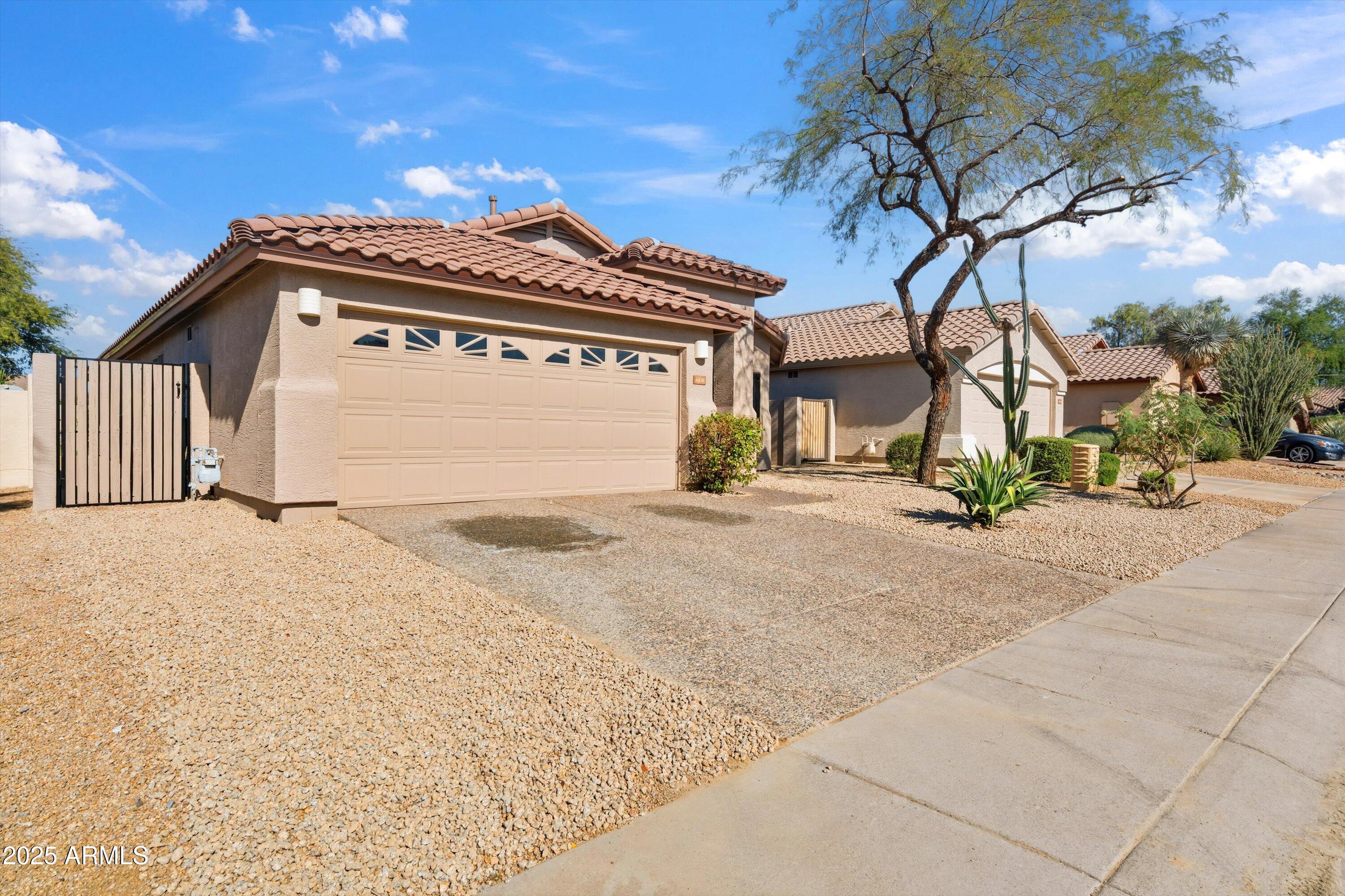 4438 East Rowel Road Phoenix, AZ 85050 - Photo 7 of 30 a view of a house with a snow on the road