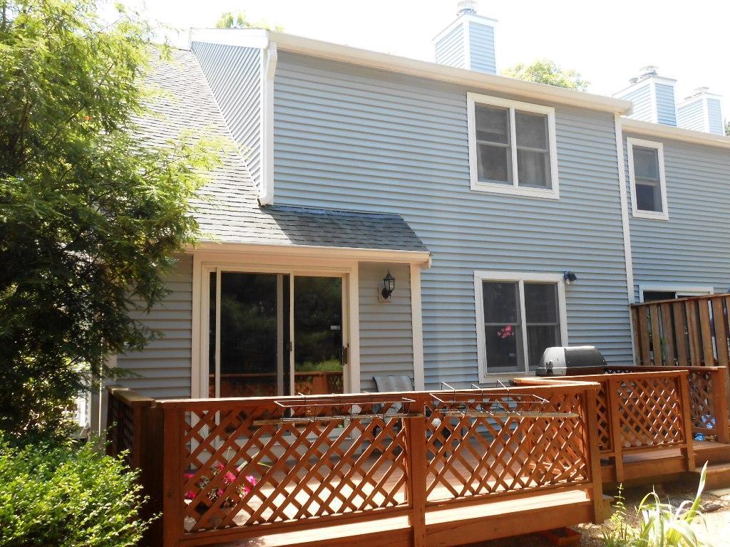 105 Shellback Way, Unit P Mashpee, MA 02649 - Photo 15 of 29 a view of a house with a deck