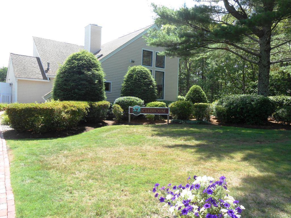 105 Shellback Way, Unit P Mashpee, MA 02649 - Photo 19 of 29 a front view of a house with garden