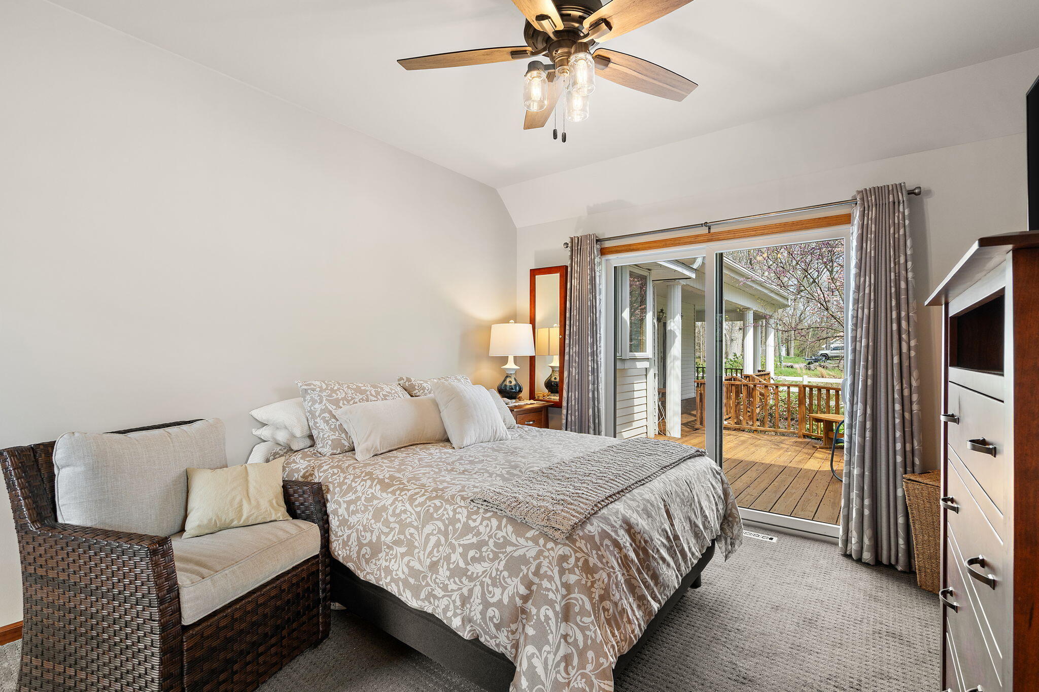 8 Smoke Road Valparaiso, IN 46385 - Photo 24 of 60 a bedroom with a bed and a chandelier