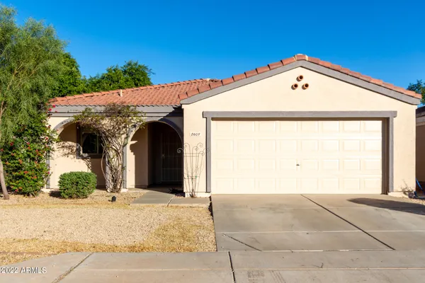 a view of a house with a garage