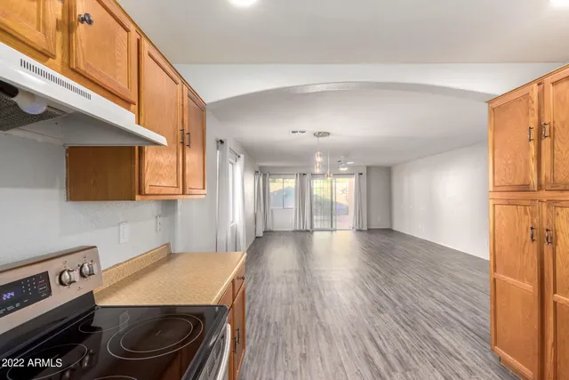 a view of a kitchen with a sink and a microwave