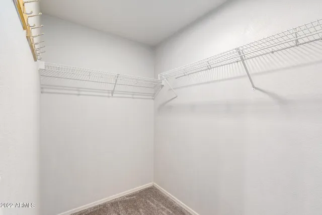 a view of a room with racks on the wall