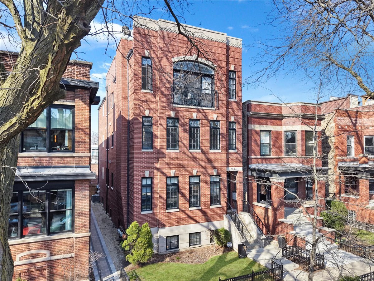 1244 West Cornelia Avenue, Unit 2 Chicago, IL 60657 - Photo 1 of 1 front view of a building