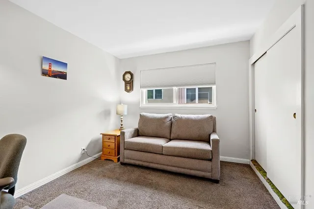 a bathroom with a bathtub sink vanity mirror and toilet
