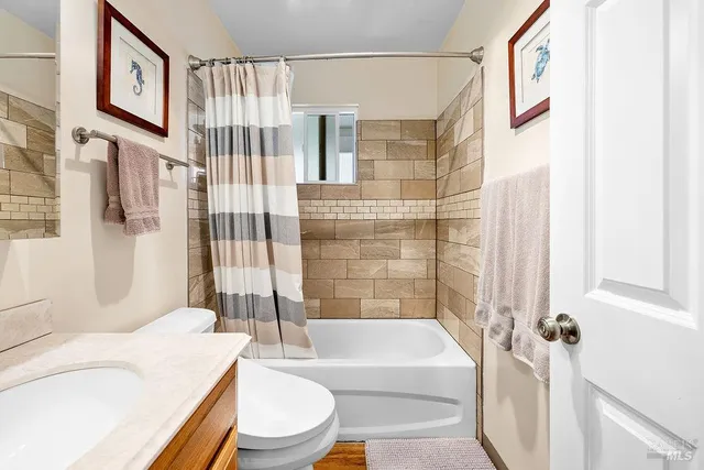 a view of a patio with a backyard table and chairs