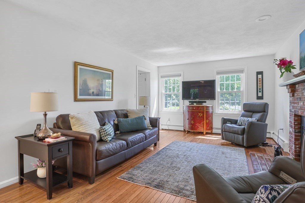5 Bayberry Road Natick, MA 01760 - Photo 9 of 41 a living room with furniture flat screen tv and a window