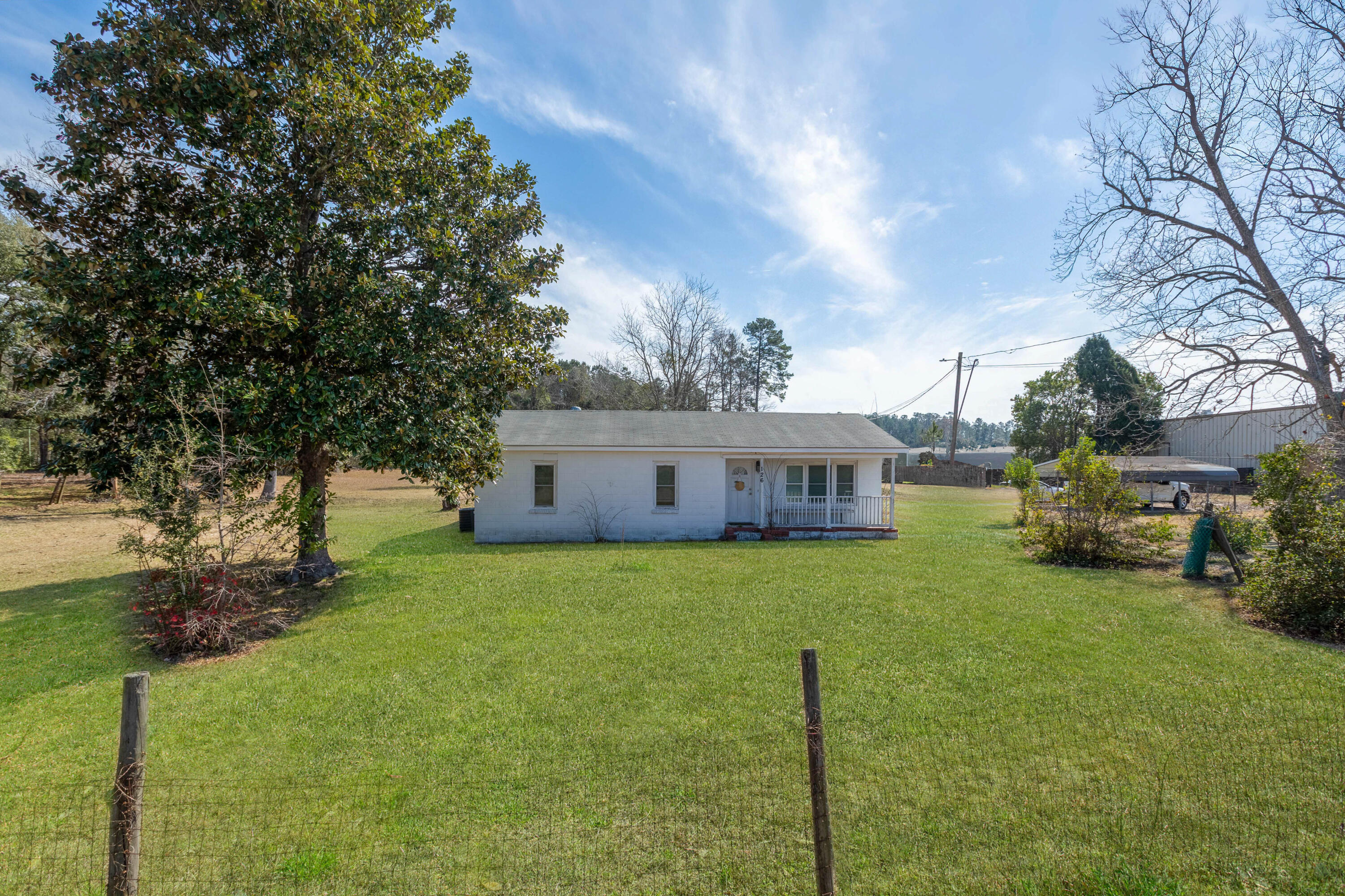 126 North N Highway Moncks Corner, SC 29461 - Photo 17 of 45 126 N Hwy 52 Grass Retouch_Brett Martin