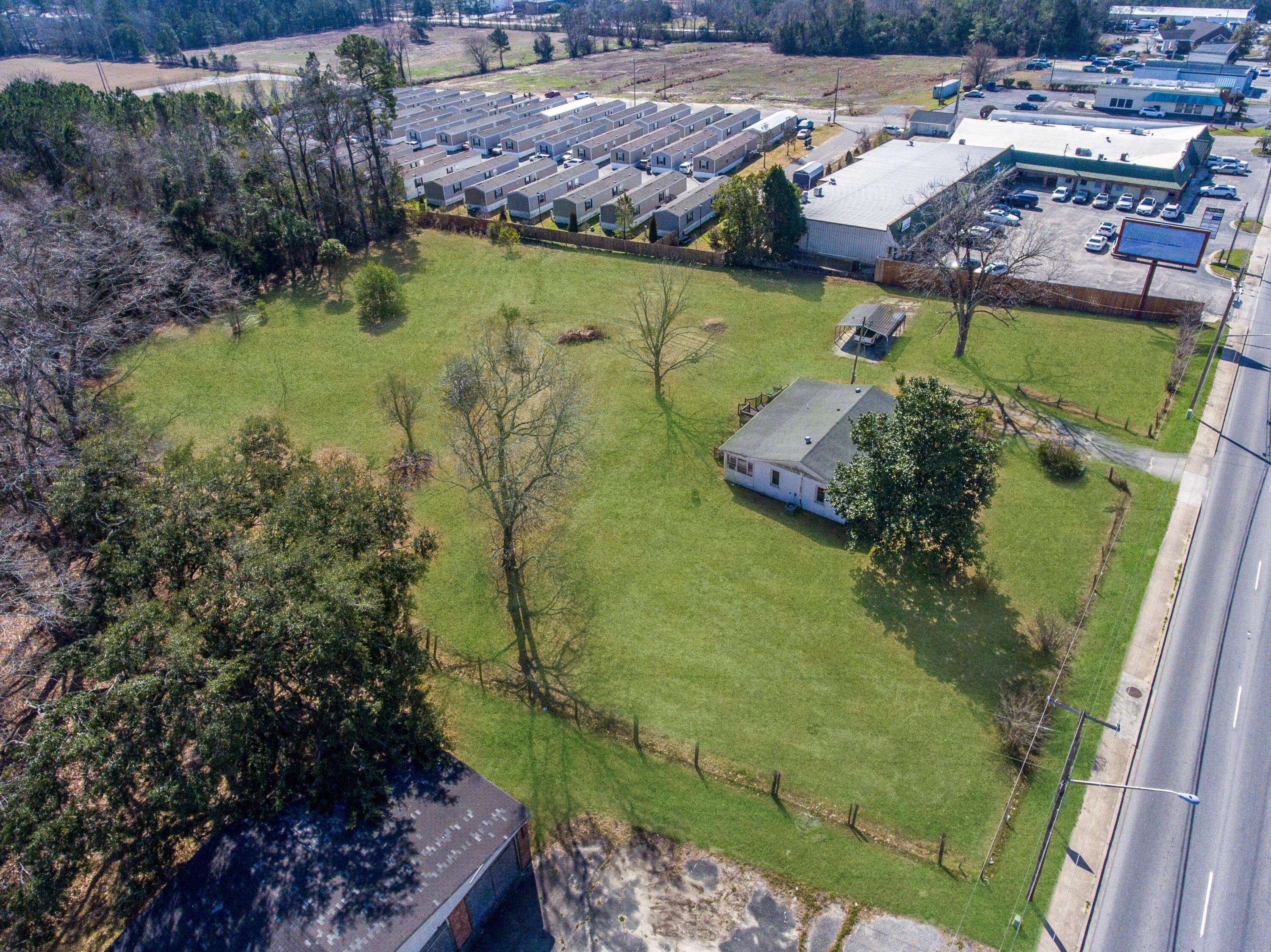 126 North N Highway Moncks Corner, SC 29461 - Photo 4 of 45 126 N Hwy 52 Grass Retouch_Brett Martin