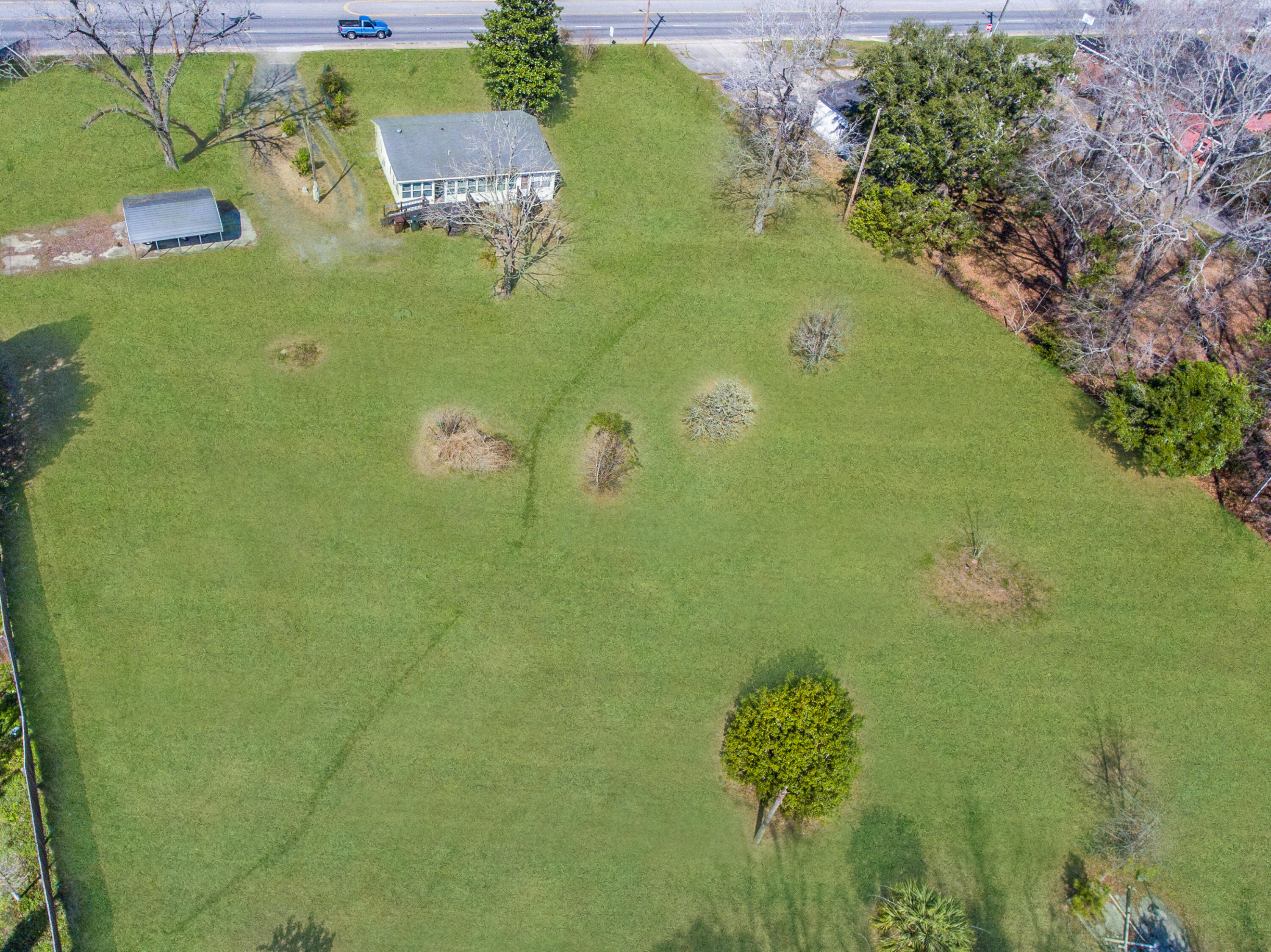 126 North N Highway Moncks Corner, SC 29461 - Photo 9 of 45 126 N Hwy 52 Grass Retouch_Brett Martin