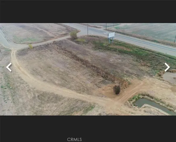 a view of beach and a yard
