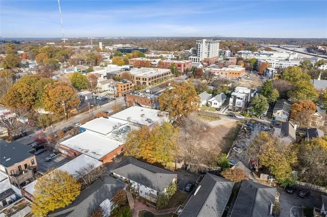 an aerial view of residential building with parking space