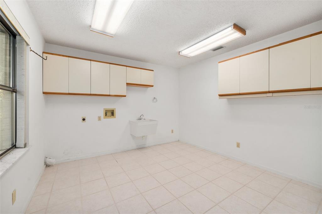 11606 Northwest 120th Terrace Alachua, FL 32615 - Photo 18 of 46 a view of storage and utility room with closet