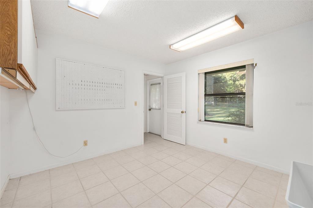 11606 Northwest 120th Terrace Alachua, FL 32615 - Photo 19 of 46 an empty room with windows