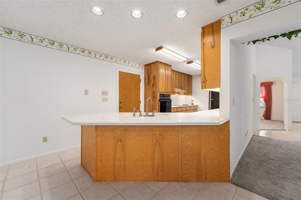 11606 Northwest 120th Terrace Alachua, FL 32615 - Photo 24 of 46 a bathroom with a sink and a mirror
