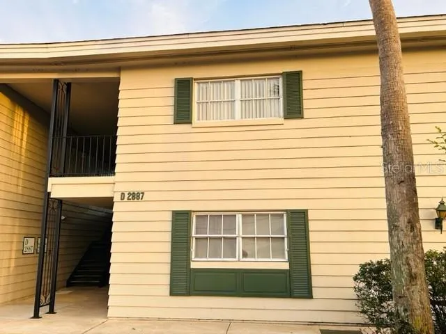 a view of a house that has a window