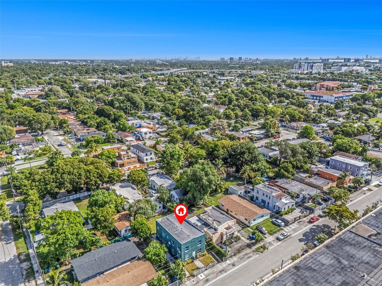 1075 Northwest 30th Street Miami, FL 33127 - Photo 9 of 12 an aerial view of multiple house